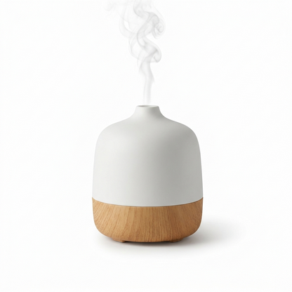 Ultrasonic essential oil diffuser on white background
