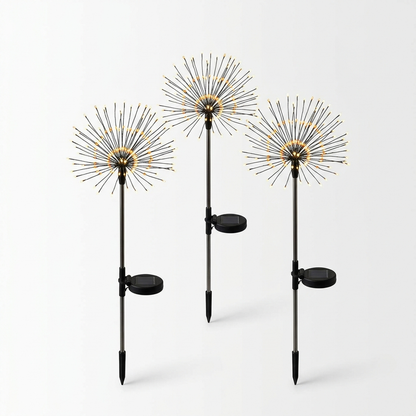 Firework burst solar garden stake lights on white background